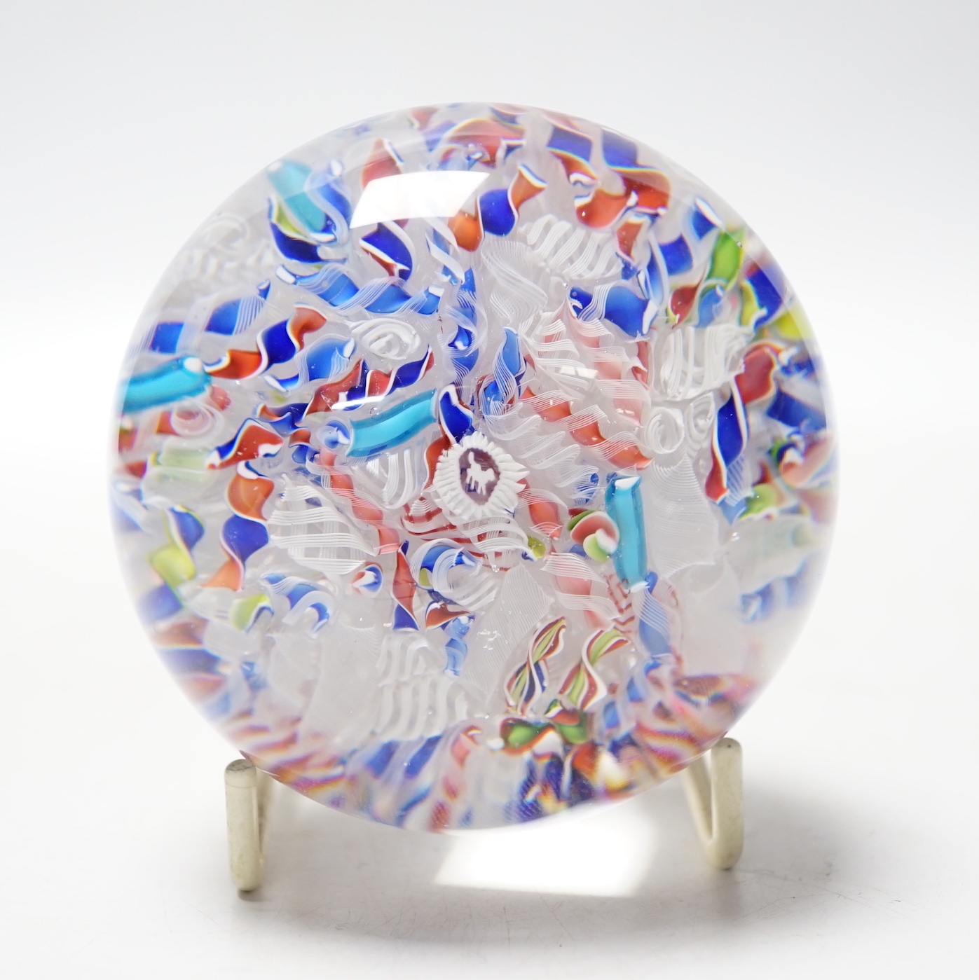 A St Louis paperweight with dog silhouette amid scrambled canes, 8cm diameter